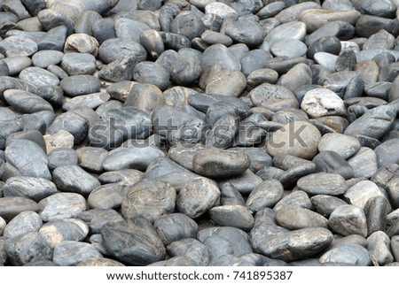 Background of pebble stone. Selective focus