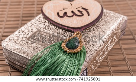 Quran, love and candles Royalty-Free Stock Photo #741925801