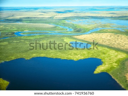 Aerial view on North Yakutia tundra landscapes from a plane
