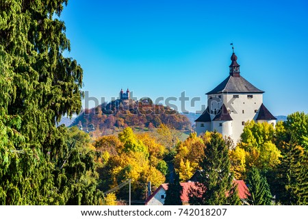 New castle and Calvary - autumn in Banska Stiavnica, Slovakia, UNESCO Royalty-Free Stock Photo #742018207