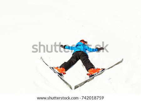 Exhausted Teenage Girl Lying In The Snow