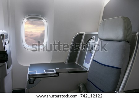 Interior of airplane with empty seats