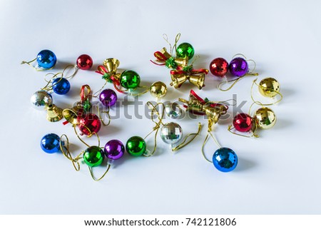 Background for a Christmas card, different Christmas toys of different colors on a Christmas tree.