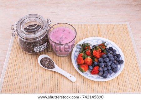 Chia seeds with fresh berries juice, healthy nutritious anti-oxidant superfood drinks