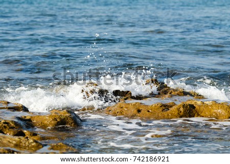 sea wave stones foam water