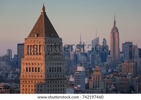 Empire state building and the other New York skyscrapers Manhattan skyline rooftop view