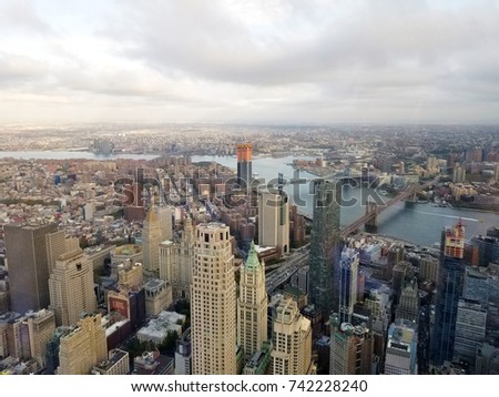 New York City. Beautiful aerial view of Manhattan. New York City skyline with the Three main Bridges. World Trade Center in Manhattan.
