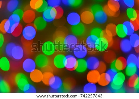 Christmas bokeh background, copy space. Defocused new year bokeh lights, free space. Blurred bokeh. Abstract holiday glitter background