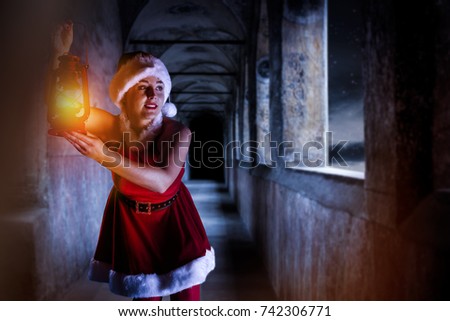 woman with lamp and xmas time 