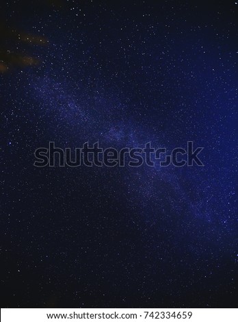 strewn with stars the sky is visible from above because of the grass Royalty-Free Stock Photo #742334659
