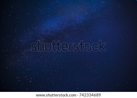 in the blue night sky the stars are visible Royalty-Free Stock Photo #742334689