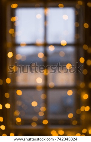 Blurred window texture with Christmas lights