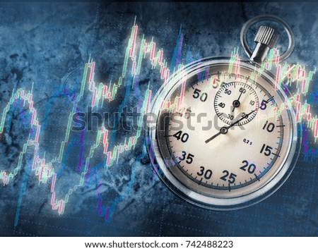 Candlestick chart graphic and stopwatch in light