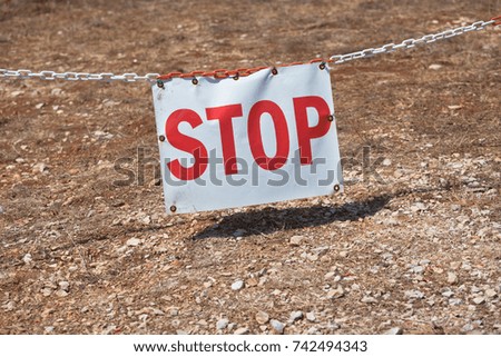 Stop sign restricting entry. Horizontal shot