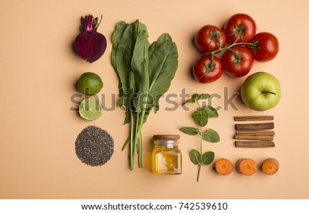 Beutiful picture of fresh vegetables on the soft orange background. Top view. Flat lay. Healthy food