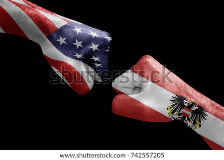 conflict between USA vs Austria, male fists - governments conflict concept,  Flags written on hands USA, USA Flag, USA  counter, fists symbol war