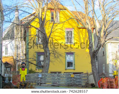 Beautiful village town neighborhood with colorful old wooden houses in autumn or fall season in Canada
