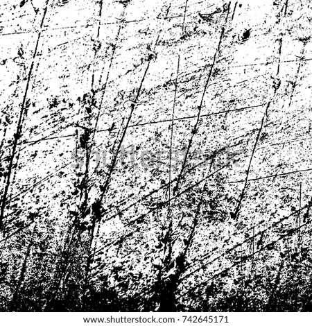 Vector black and white grunge background from stains and cracks
