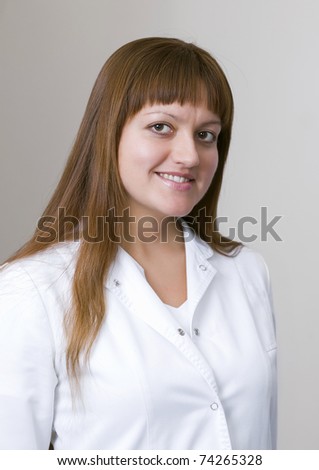 Female doctor or nurse smiling