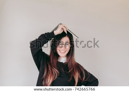 Young asian Student woman holding book with copy space