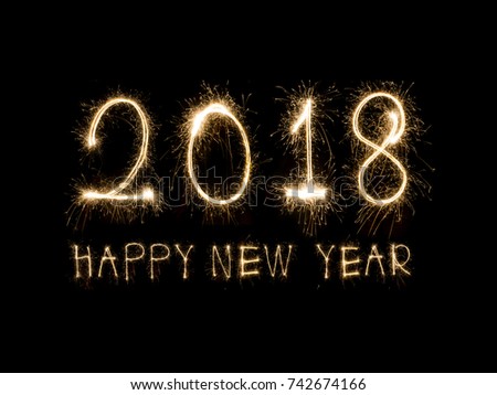 Happy new year 2018  written with Sparkle firework Royalty-Free Stock Photo #742674166