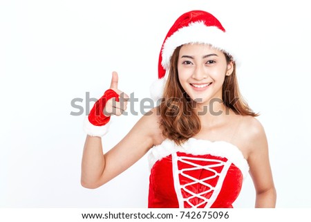 Young woman in santa claus hat on white background.Christmas woman