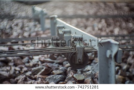 Components of railroad switch.The equipment for the trains change from the original track when needed.Can be controlled with a pedal railroad switch back the sling or electric motors pull it.