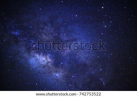 Milky way galaxy with stars and space dust in the universe, Long exposure photograph, with grain. Royalty-Free Stock Photo #742753522