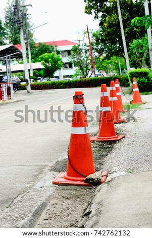 Traffic cones are placed to indicate who can not park the car.