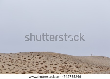 A beautiful sand dune in the middle of Norway. Northern desert in central Scandinavia in autumn. Colorful scenery that looks like a barren land.