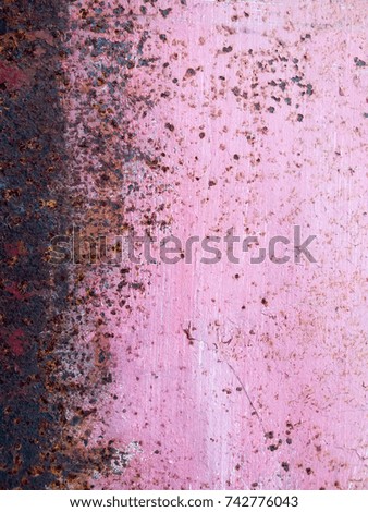 Pink and rusted iron plate are used as background images