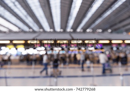 Abstract blurred people and bokeh background at airport