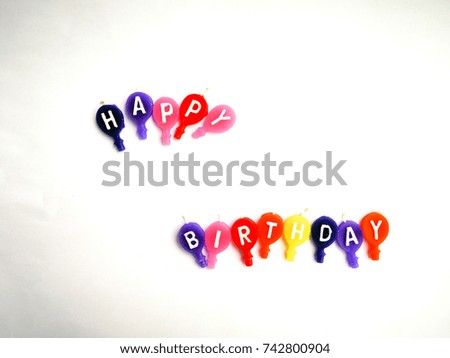 the words Happy Birthday made by colorful balloon shaped candles isolated on white surface in landscape orientation

