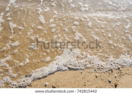 Soft wave ocean on sandy beach, Background.