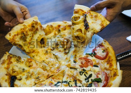 Seafood pizza rustic table background , Seafood pizza on wooden plate