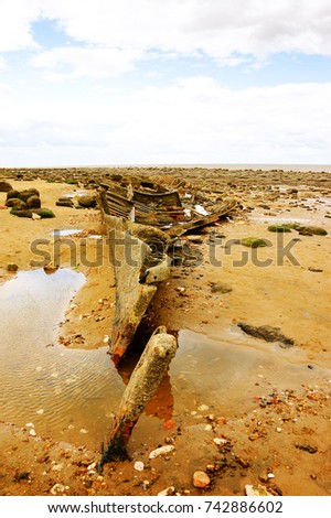 Norfolk, UK. Remains of ship (after shipwreck) at Hunstanton beach.