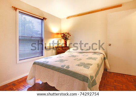 Bedroom in a garden house with one queen size bed.