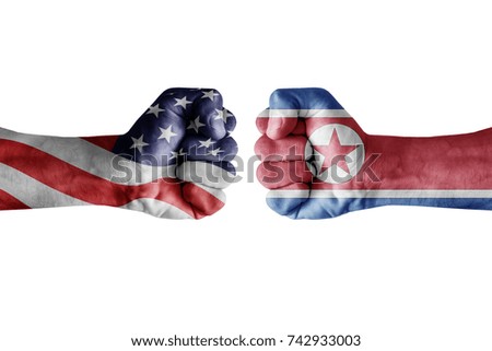 conflict between USA vs Korea north, male fists - governments conflict concept,  Flags written on hands USA, USA Flag, USA  counter, fists symbol war