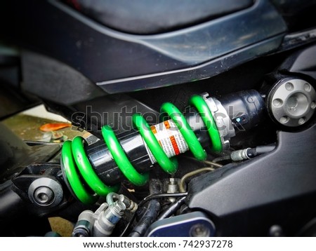 Shock absorbers in motorcycle is equipment part to serves the weight.