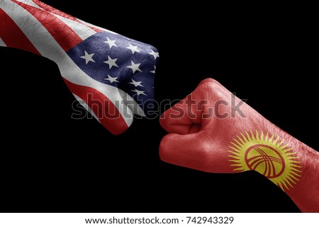 conflict between USA vs Kyrghyzstan, male fists - governments conflict concept,  Flags written on hands USA, USA Flag, USA  counter, fists symbol war