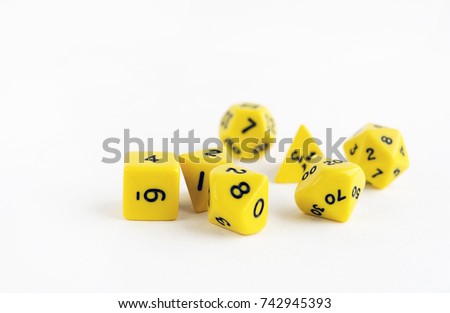 Set of yellow dices for rpg, dnd or board games on light background