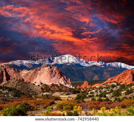 Pikes Peak Soaring over the Garden of the Gods with Dramatic Sky Royalty-Free Stock Photo #742958440