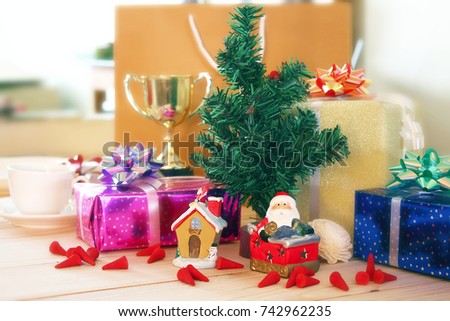 Christmas tree decoration with Santa Claus and gifts.