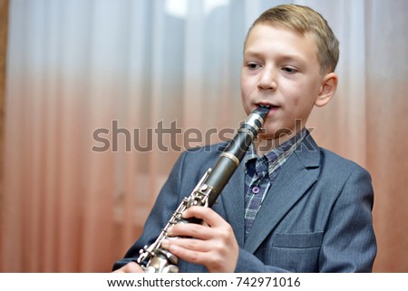 Boy playing the clarinet