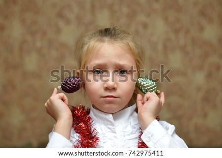 Funny children keep buhirb for Christmas and New Year