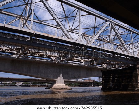 A bridge for crossing the river,a traditional steel structure.