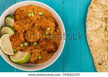 Indian Style Vegetable Kofta Curry Meal On A Blue Wooden Background With Naan Bread And Copy Space