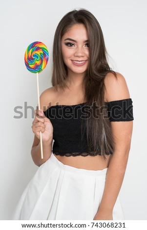 Happy young woman on a white background