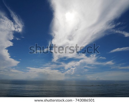 Strip white dragon cloud deep blue sea