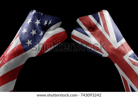 conflict between USA vs United kingdom, male fists - governments conflict concept,  Flags written on hands USA, USA Flag, USA  counter, fists symbol war